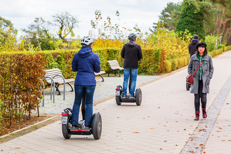 Bansin, Germany - October 10, 2017: unidentified people with Segway on Usedom. The Segway PT is a two-wheeled, self-balancing, battery-powered electric vehicle popular for tourist use in big citiesのeditorial素材