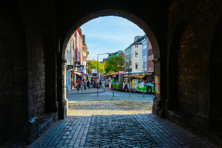 Aachen, Germany - October 12, 2018: through the Ponttor with unidentified people. The Ponttor is one of the two remaining gates of the original city wall of Aachen, built in the 14th centuryのeditorial素材