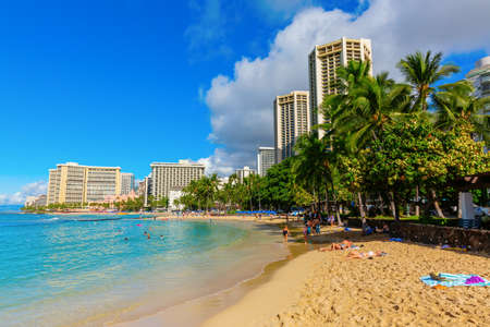 Honolulu, Oahu, Hawaii - November 04, 2019: view of Waikiki beach with unidentified people. Waikiki...