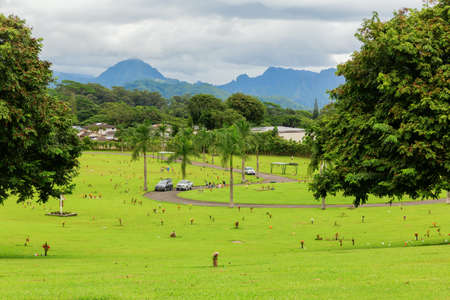 Oahu, Hawaii - November 04, 2019: overall view of the Valley of the Temples Memorial Park, where thousands Buddhist, Shinto, Protestant and Catholic Hawaiian residents are buried.のeditorial素材