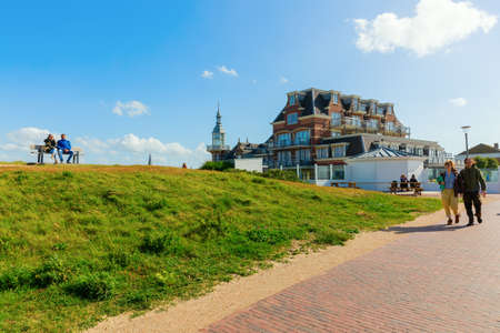 Domburg, Netherlands - June 08, 2019: scene on the dunes with an old villa in Domburg, with unidentified people. Domburg is a popular tourist destination in the province Zeelandのeditorial素材