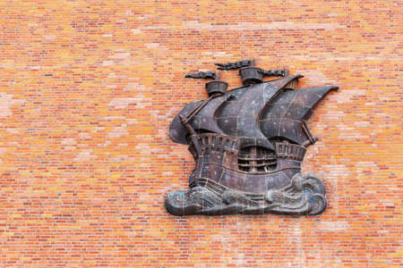 Stralsund, Germany May 12, 2018: bronze mural relief at a building in Stralsund. The historic Stralsund old town island is a UNESCO World Heritage Siteのeditorial素材