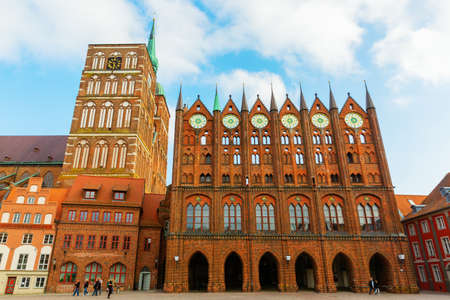 Stralsund, Germany May 12, 2018: St Nicolas Church and historic town hall in Stralsund, with unidentified people. The historic Stralsund old town island is a UNESCO World Heritage Siteのeditorial素材