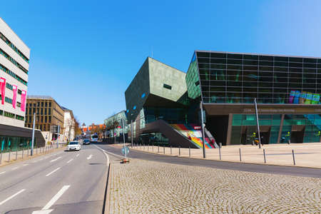 Darmstadt, Germany April 08, 2018: Darmstadtium building in Darmstadt, with unidentified people. It is a modern science and congress center, designed by Talik Chalabi, opened 2007のeditorial素材
