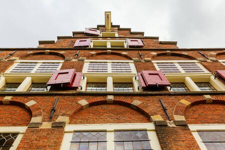 picture of a gable of a typical old building in Amsterdam, Netherlandsの写真素材