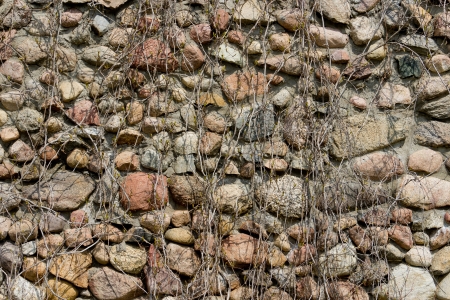 An old boulder stone wall の写真素材