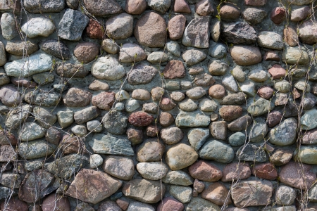 An old boulder stone wall の写真素材