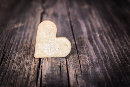 Heart of the cookies and the wooden background.の写真素材