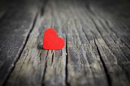 Red heart on wooden backgroundの写真素材