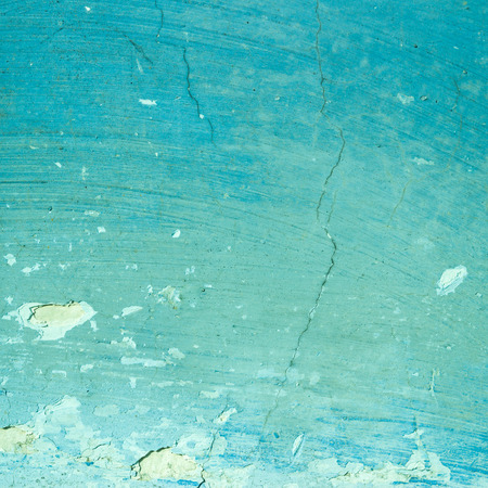Blue grunge textured wall closeupの写真素材