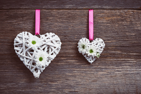 White heart on old wooden backgroundの写真素材