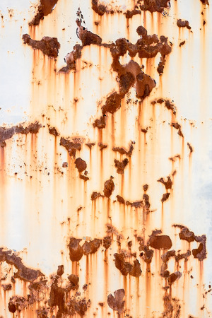Old painted metal texture with traces of rust and cracks.の写真素材