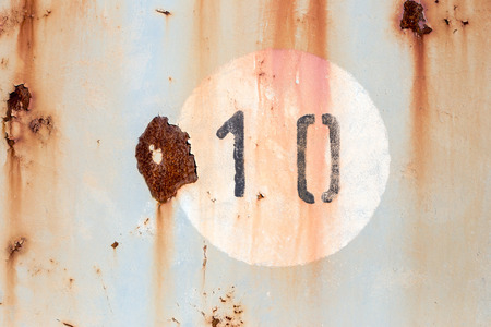 Number 10 on old painted and rusted metal panelの写真素材