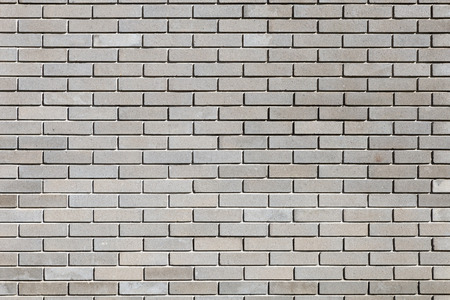 Background texture of a gray brick wall