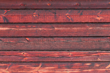 The old red wood texture with natural patternsの写真素材
