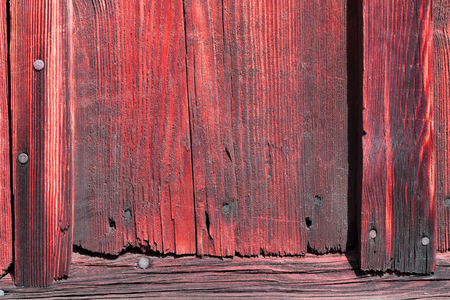 The old red wood texture with natural patternsの写真素材