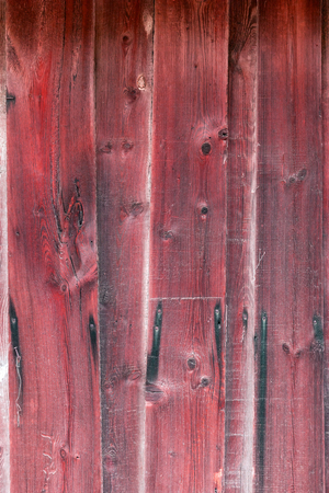 The old red wood texture with natural patternsの写真素材