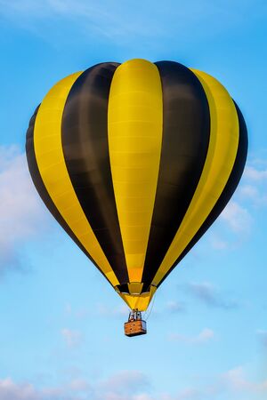 A colorful hot air balloon in the skyの写真素材
