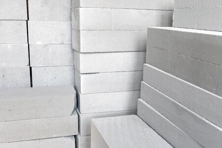 Stack of white lightweight concrete block, used for construction wall