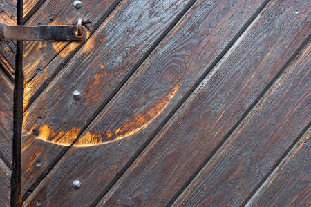 Old wooden door - grunge background texture for design.の写真素材