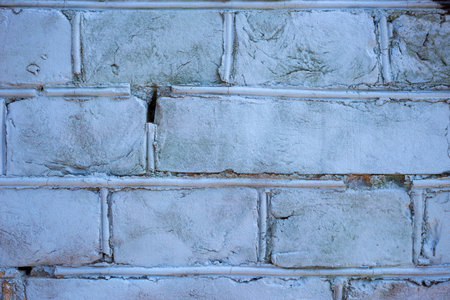 Old painted bricks for use as a backgroundの写真素材