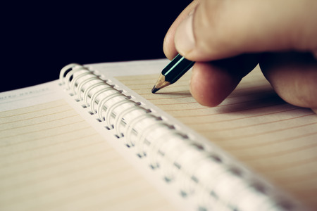 Man starting to write something