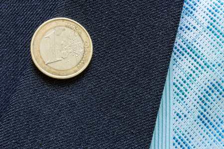 Close up of a few buttons on a business suit coatの写真素材