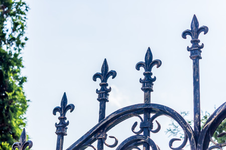 Close up shot to a vintage metallic fence in the heat of the summerの写真素材