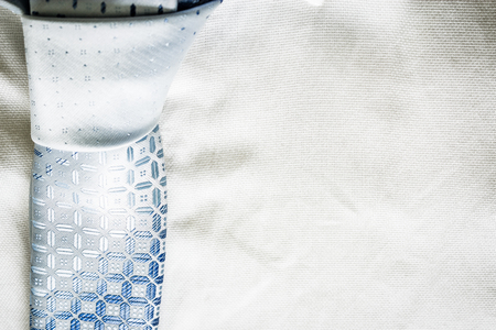Closeup of a shirt texture and a blue business tieの写真素材