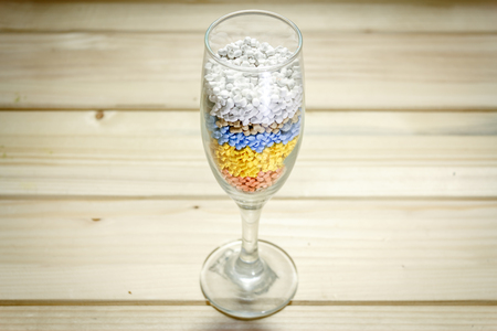 Shot of a glass full of plastic particlesの写真素材