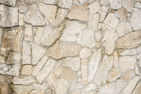 Close up shot to a rocky wall textureの写真素材