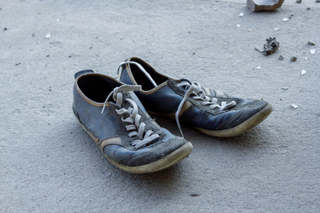 Abandoned sneakersの写真素材