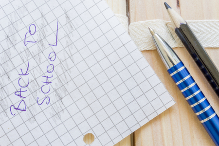 Macro of a paper with text and pencil near penの写真素材