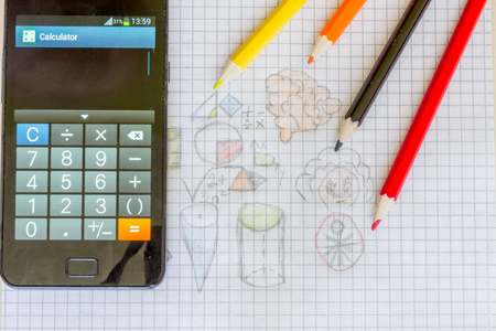 Big collection of elements, symbols and schemes of physics, chemistry and sacred geometry and a calculator on a mobile phone. The science and technology theme.の写真素材