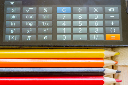 Close up of calculator and pencilsの写真素材