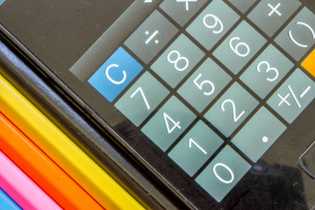 Close up of calculator and pencilsの写真素材
