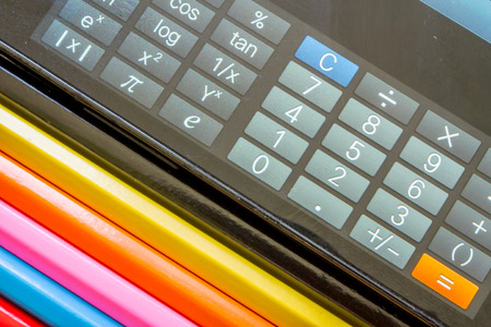 Close up of calculator and pencilsの写真素材
