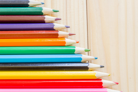 Macro of a few colored pencils on woodの写真素材