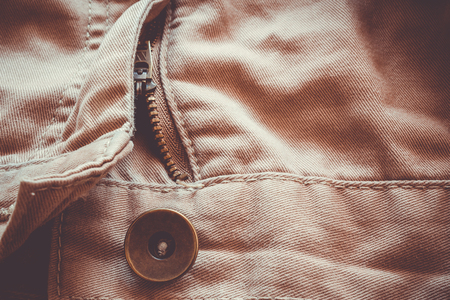 Beige jeans with texture. Close up to fabric