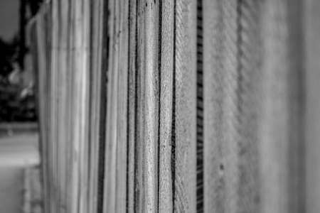 blac kand white wooden fenceの写真素材