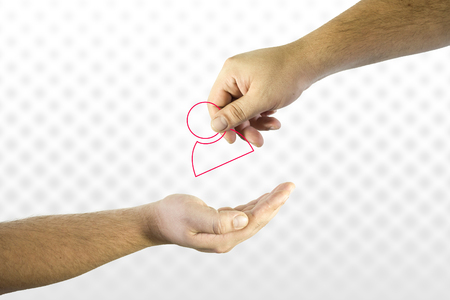 Hand giving user profile icon to another. Help or assistance in social account issues conceptの写真素材
