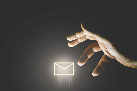 Hand stealing message icon. Hacking mailの写真素材