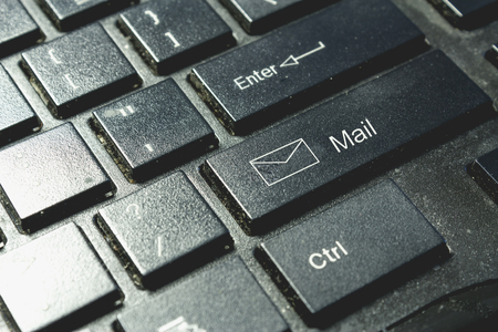 Message icon on keyboard. Cyber security conceptの写真素材