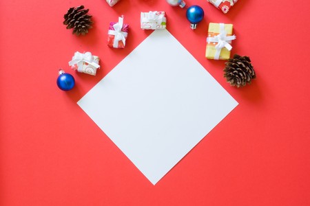 Presents on red background. Christmas shopping conceptの写真素材