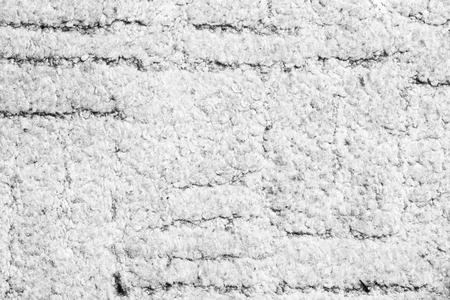 Black and white image of a fluffy carpet made from cottonの写真素材