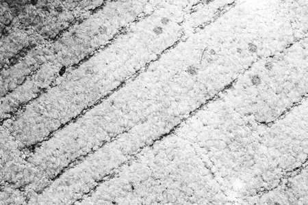 Black and white image of a fluffy carpet made from cottonの写真素材