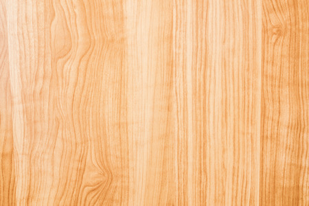 Close-up to a yellow wood furniture textureの写真素材
