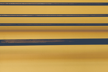 Background made from a  home hanger on yellow wall. Vintage matte coloredの写真素材