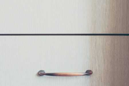Wood texture background. Closeup to handle of a furniture.の写真素材