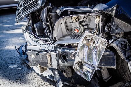 Car headlight falling after a frontal accident. Front impact crashの写真素材